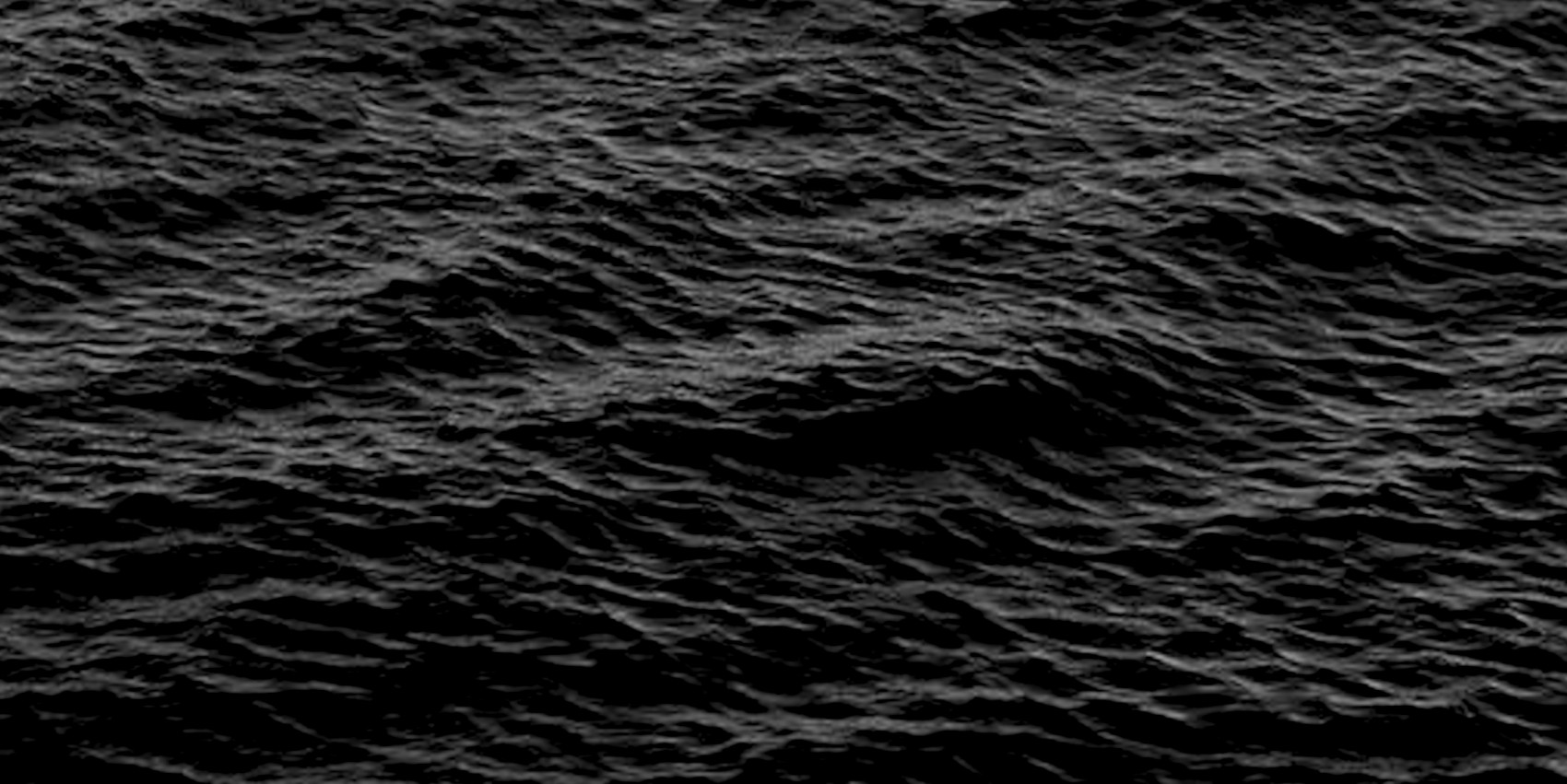 Dark sea with waves and rippled surface